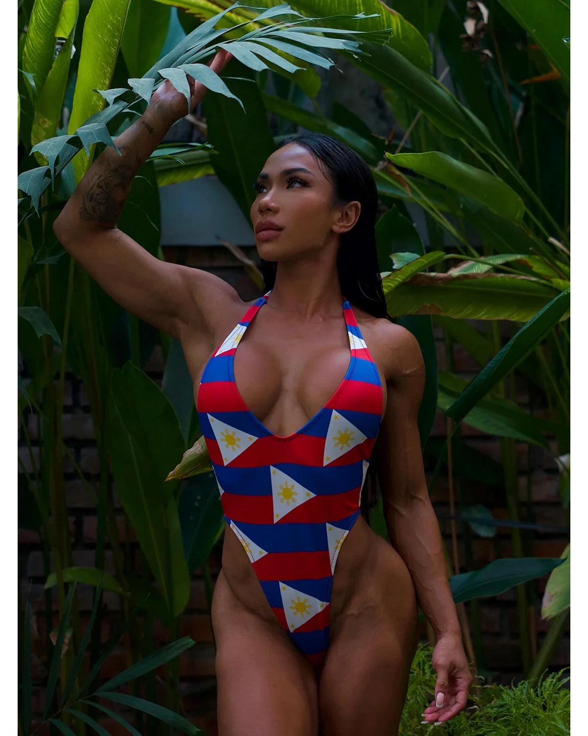 Maureen Blanquisco in a custom Filipino print one-piece swimsuit. Designed by Lucy, made in Clearwater FL