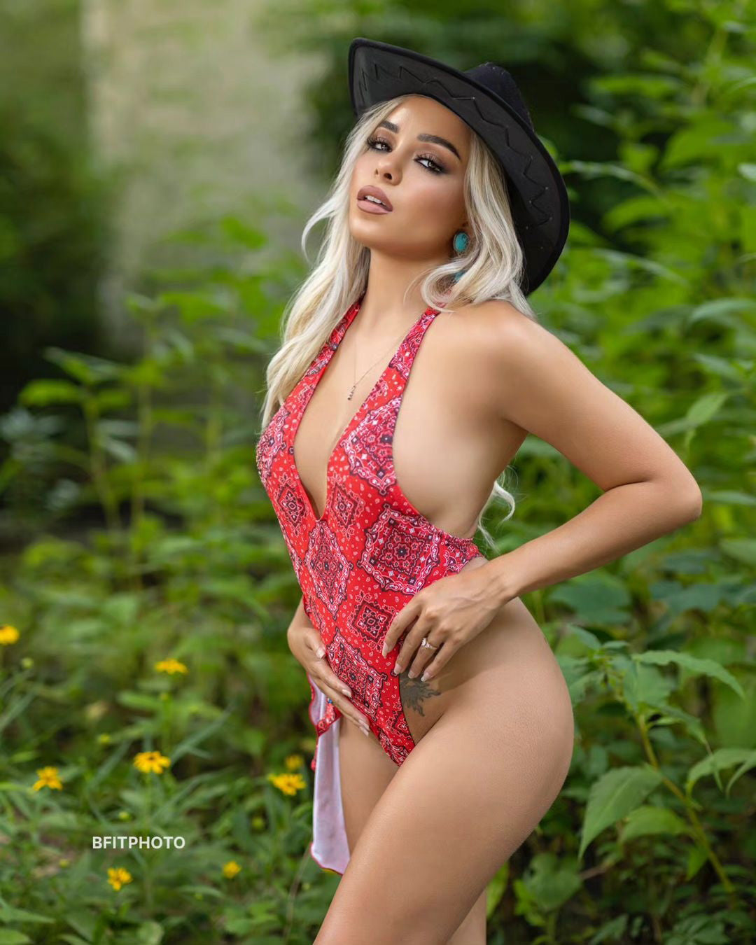 Matching headscarf one-piece swimsuit. Red Bandana print, side view. Made in America.