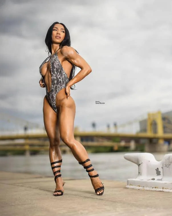 Reflective one-piece swimsuit deep plunge front. Maureen Blanquisco. Manufactured in Clearwater Florida