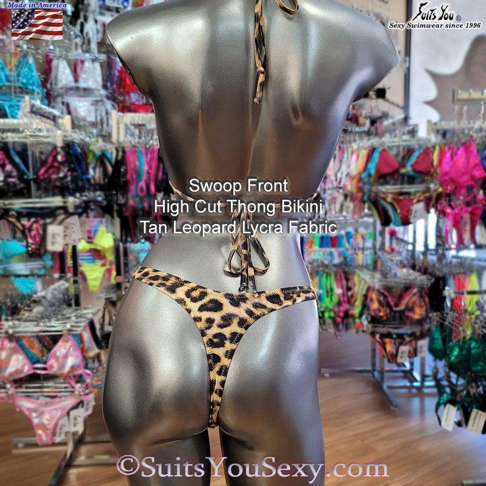 Swoop front thong bikini, model wearing barely there style, manufactured in USA